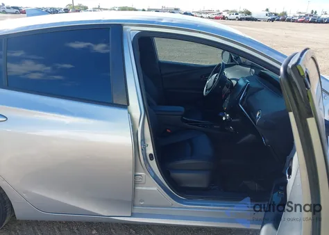 2022 Toyota Prius Prime Limited z USA, uszkodzony, nr VIN JTDKAMFP0N3211769